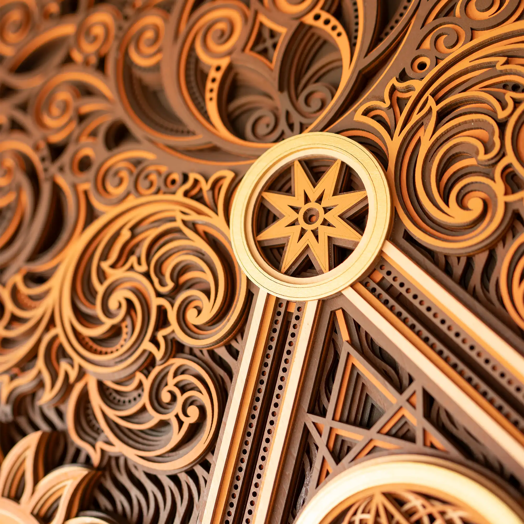 Close-up of intricate wooden design with star-like symbol