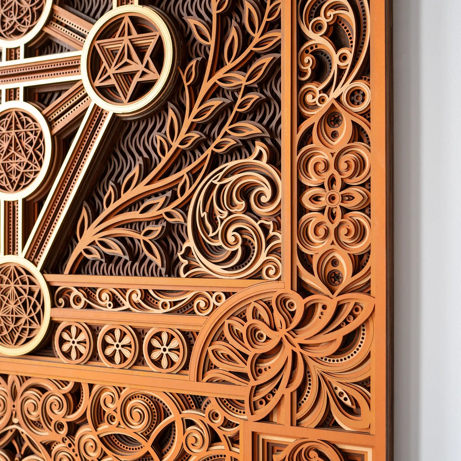 Close-up of intricate wooden carvings with geometric patterns.
