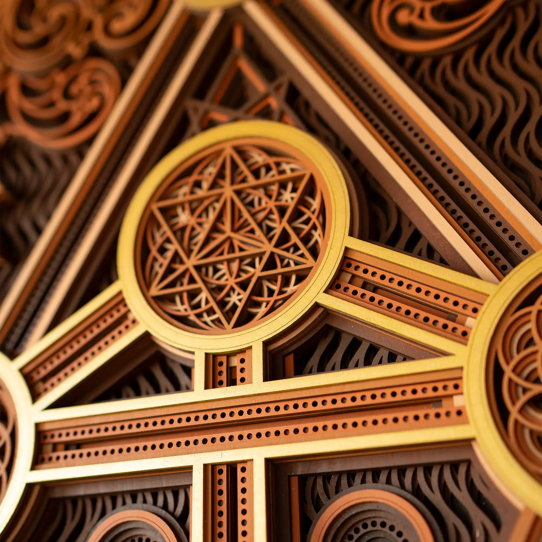 Close-up of intricate wooden geometric design with circular patterns